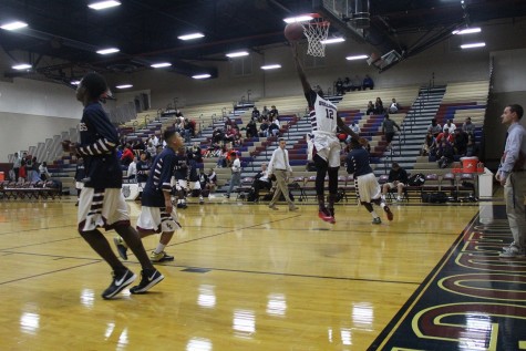 Junior Durrel W. laying up shot during warmups before the game