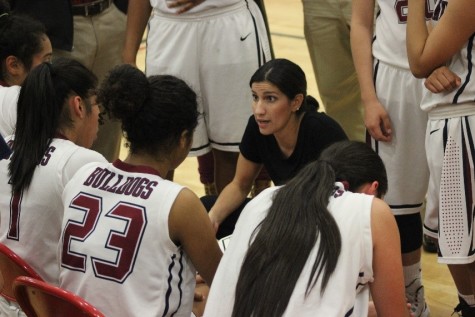 Coach Carranza using Verrados timeout as a chance to encourage her team. 