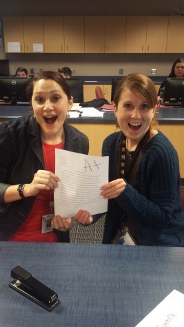English teachers (from right to left) Ms. Belenager and Ms. Furkert excitingly grading the students senior paper    